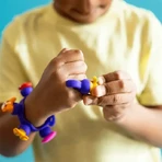 Набір браслетів і каблучок Plip Charms pop-it Plip Charms, рожевий: ціни та характеристики