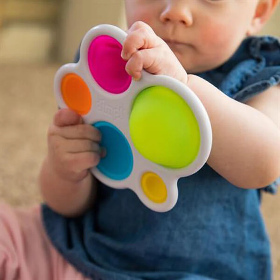 Брязкальце Fat Brain Toys прорізувач і тактильна іграшка Натисни кулю dimpl: ціни та характеристики