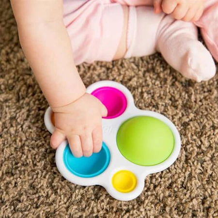 Брязкальце Fat Brain Toys прорізувач і тактильна іграшка Натисни кулю dimpl: ціни та характеристики