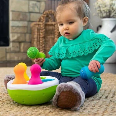 Развивающая игрушка Fat Brain Toys Сортер-балансир Неваляшки Spinny Pins: цены и характеристики