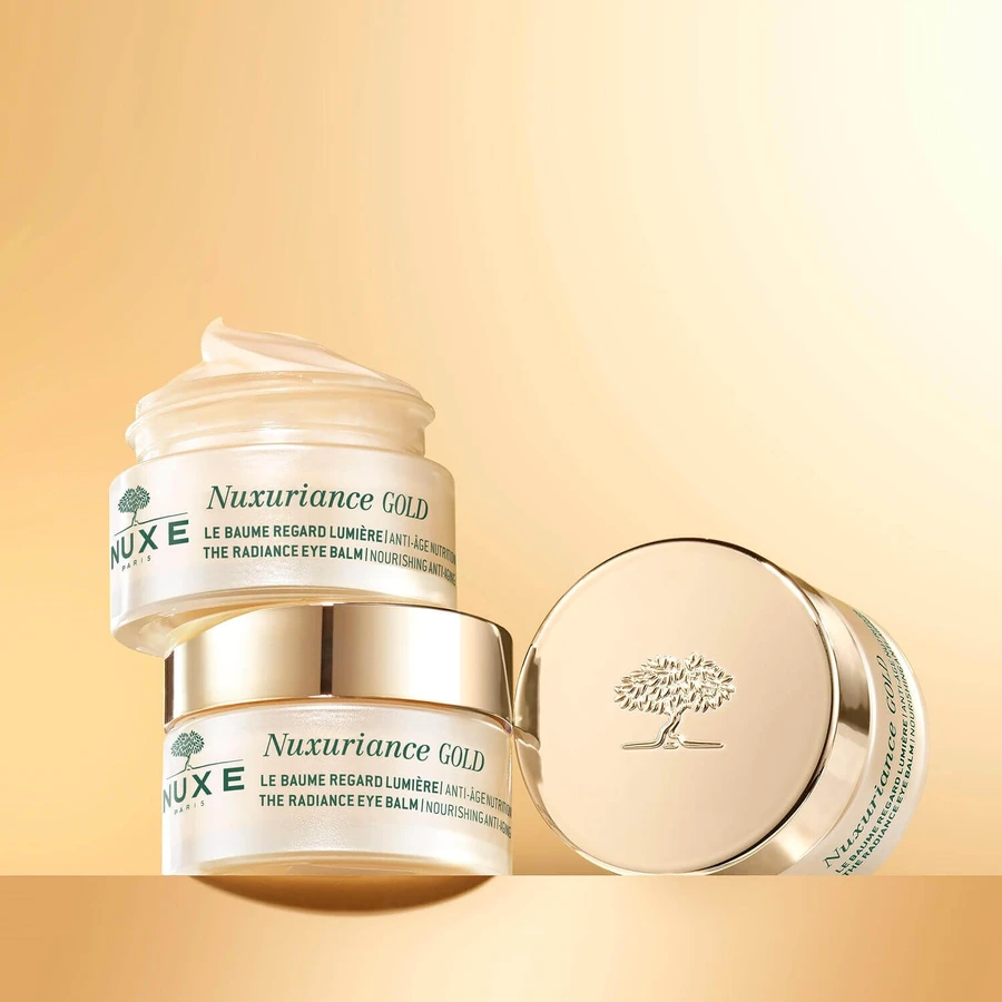 Набір Nuxe Nuxuriance Gold, loțiune de noapte hrănitoare și fortifiantă, 50 ml + balsam de ochi iluminator, piele uscată, 15 ml + geantă cosmetică gratuită: ціни та характеристики
