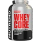 Nutrend Whey Core сироватковий протеїн Безглютеновий сироватковий протеїн з ароматизованим печивом 1,8 кг